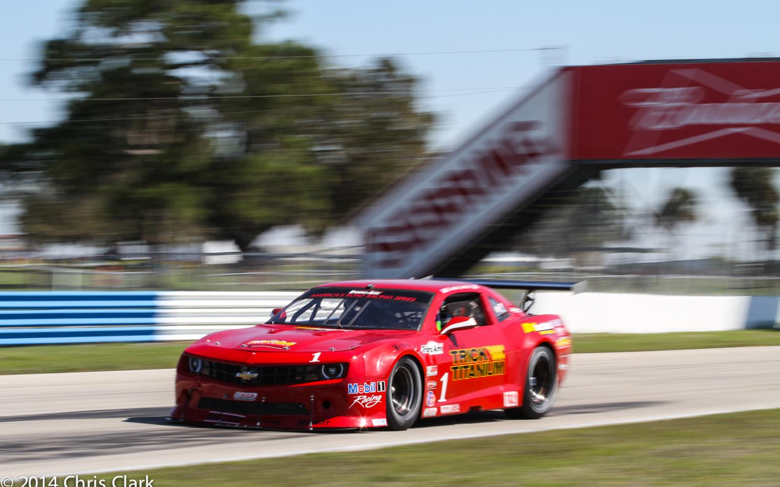 Champions lead first official practice of 2014